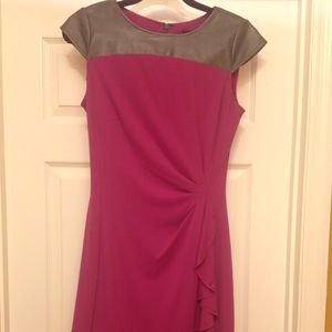 Beautiful dress with vegan leather accent.